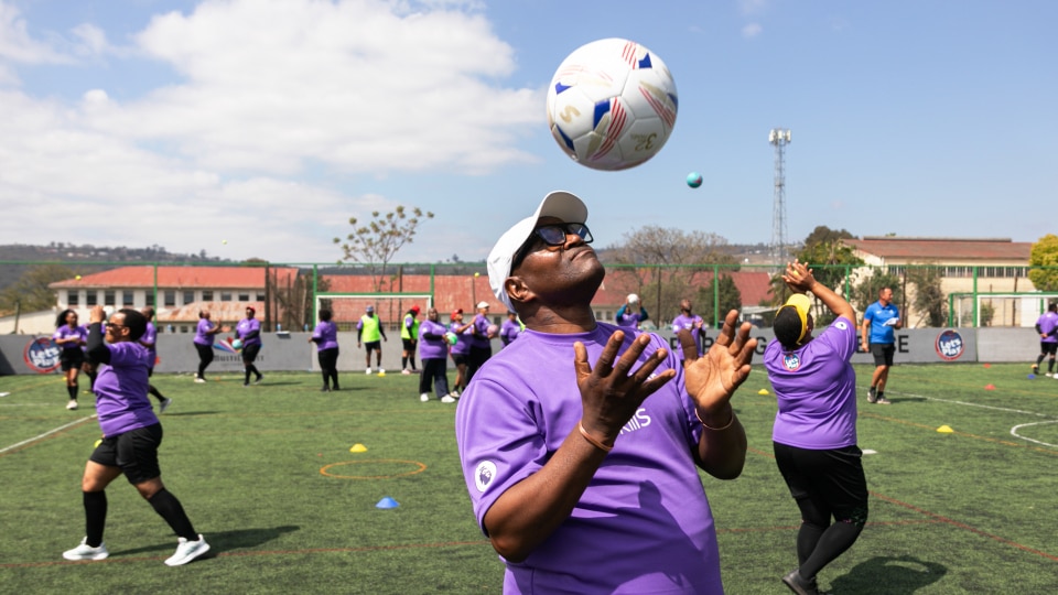 A teacher practices his catching skills