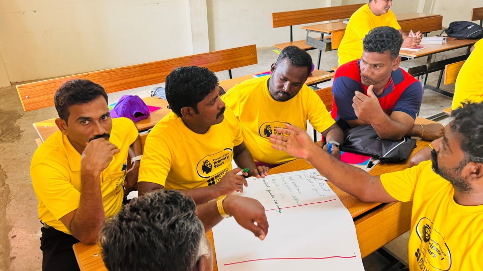 A group of teachers in India in a Premier League Primary Stars training session