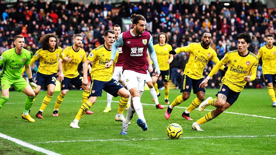 Burnley's Jay Rodriguez looks to set up a chance against Arsenal.