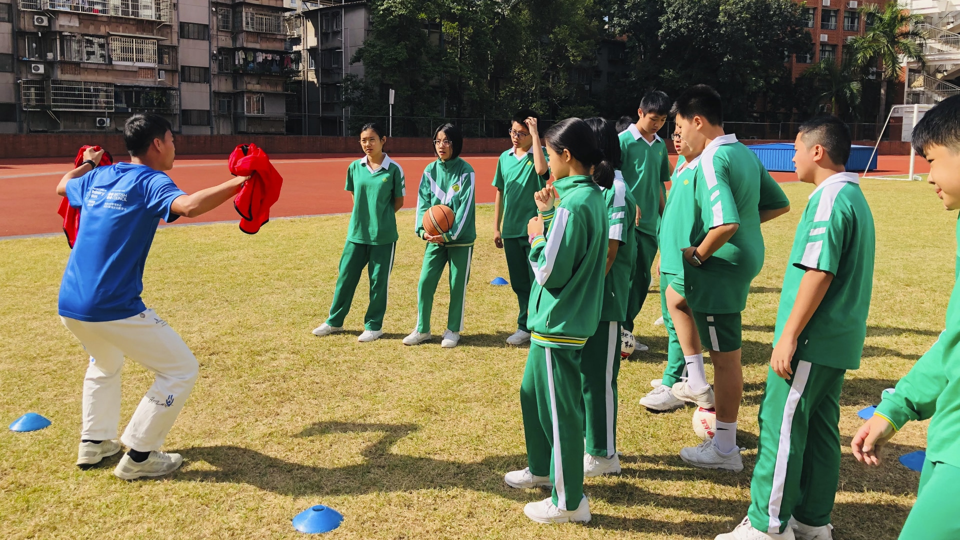 A teacher demonstrates some moves during a Premier Skills session in China