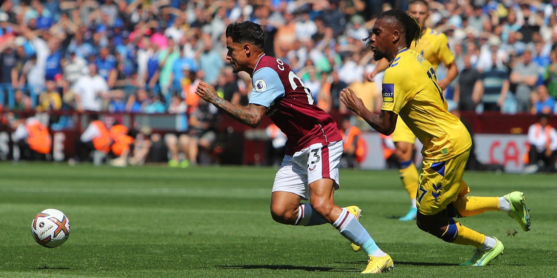 Aston Villa's Brazilian midfielder Philippe Coutinho fights for the ball with Everton's Nigerian midfielder Alex Iwobi