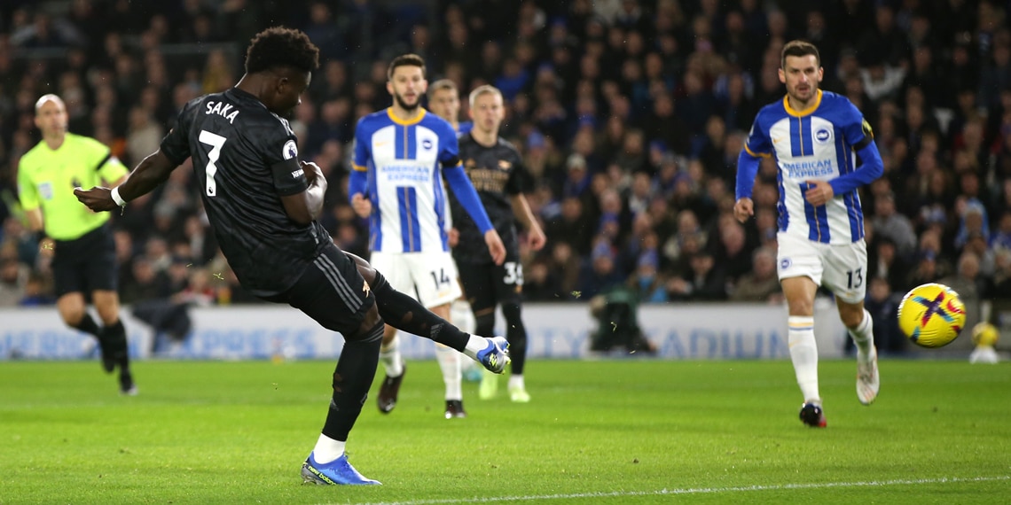 Bukayo Saka scores Arsenal's first goal during the match between Brighton & Hove Albion and Arsenal