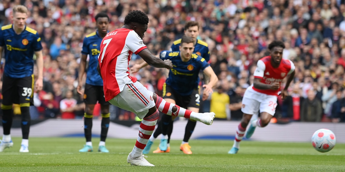 Bukayo Saka scores Arsenal's second goal from the penalty spot during the match between Arsenal and Manchester United