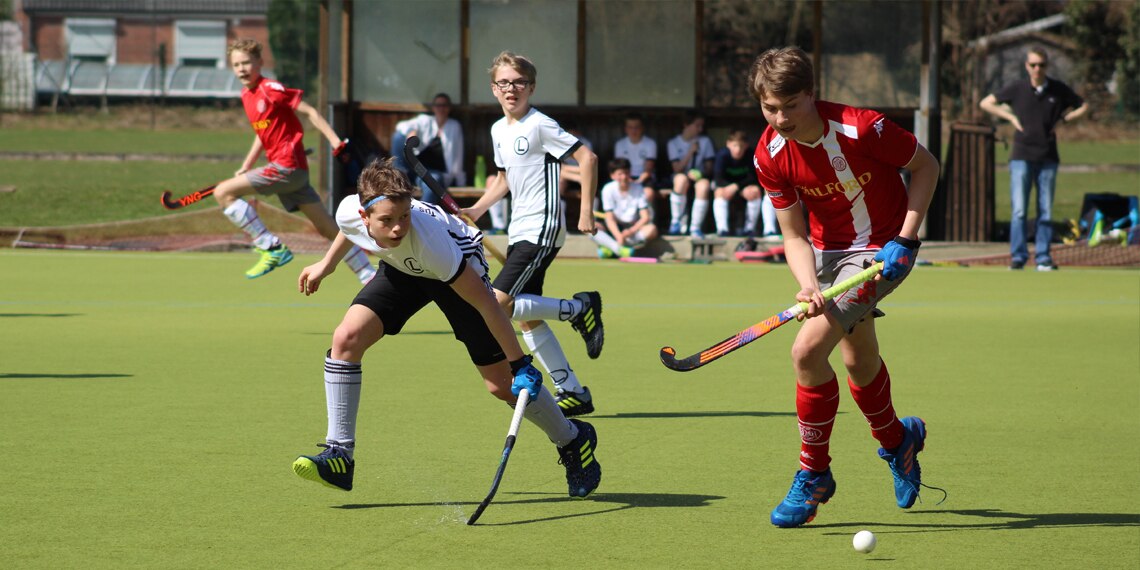 Children playing hockey