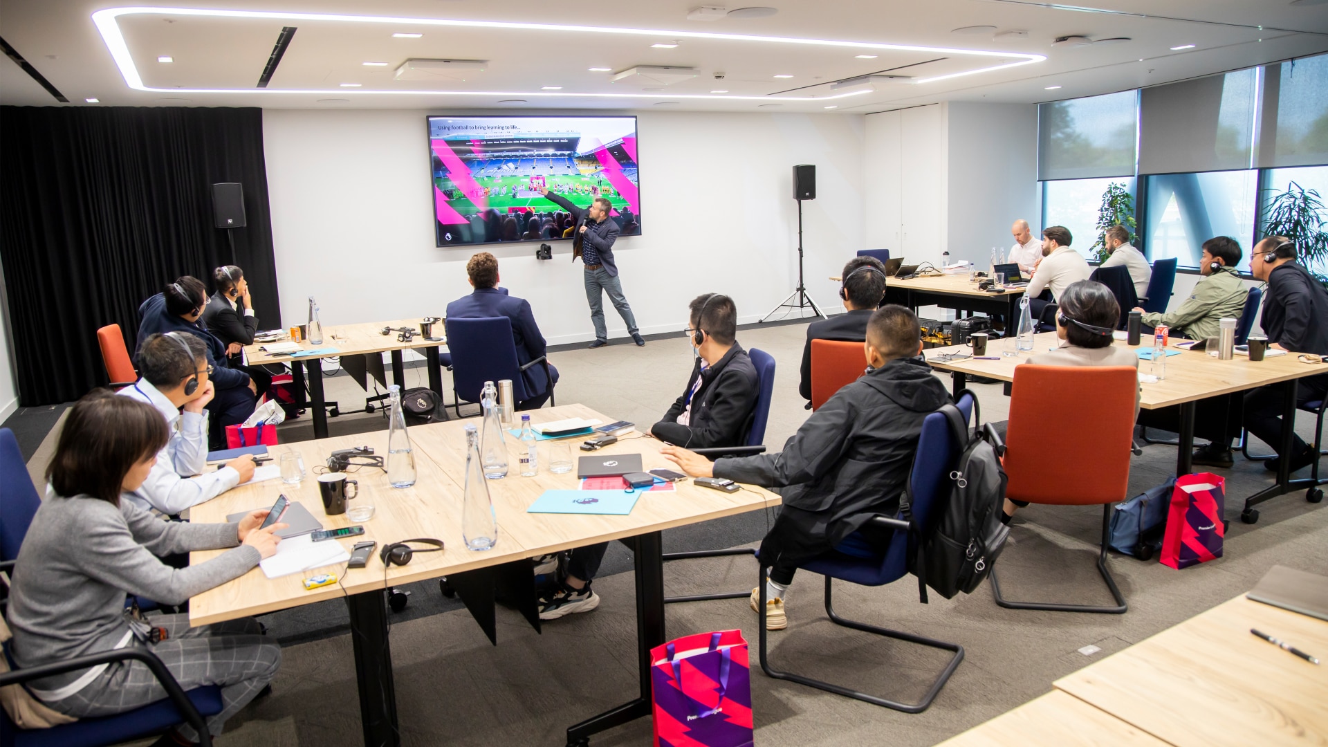 A group of Chinese teachers and teacher trainers learn about Premier League Primary Stars at the Premier League in London