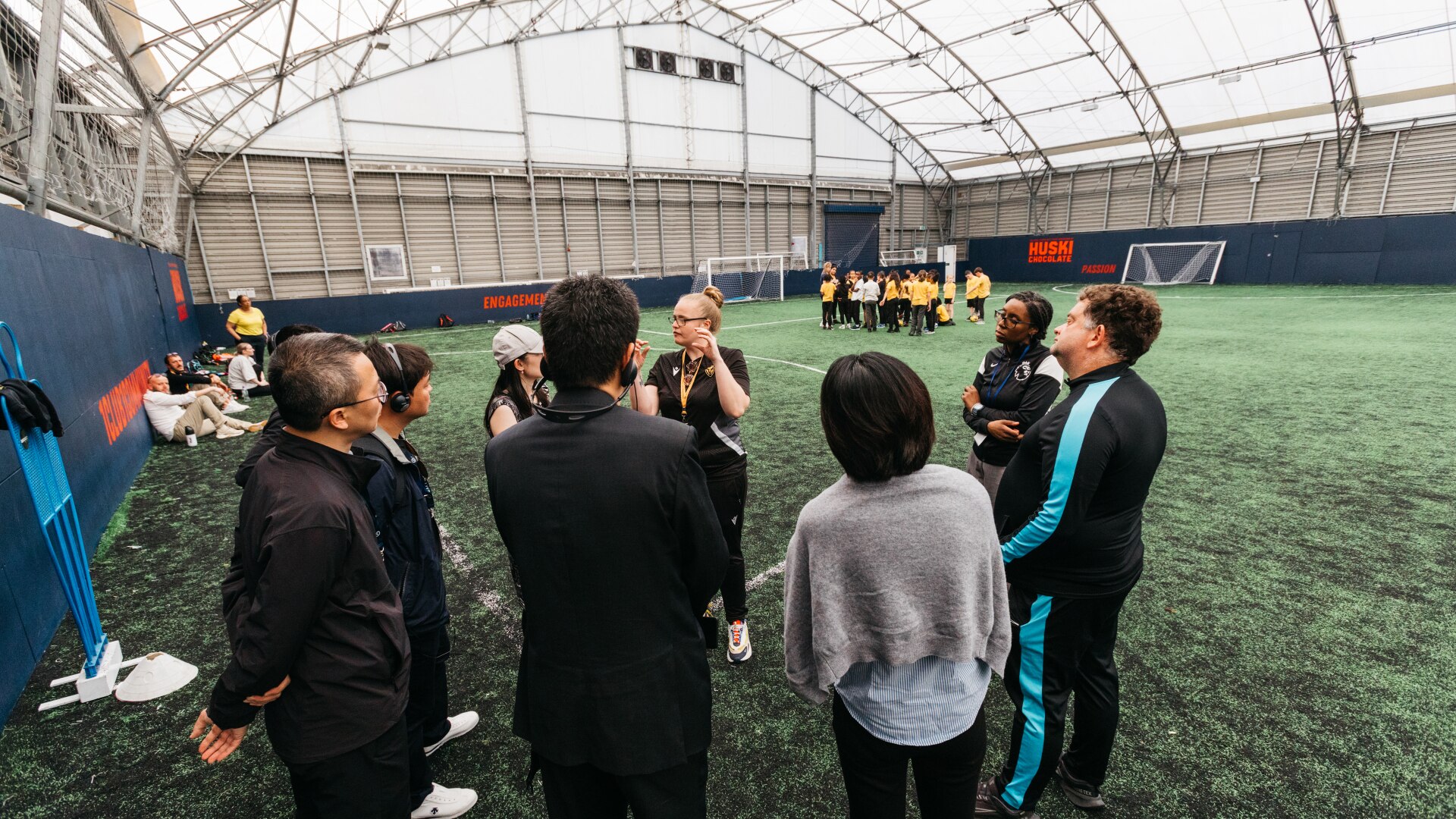 A Premier League Primary Stars coach talks to the group.