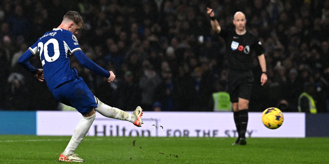 Cole Palmer scores Chelsea's fourth goal from a penalty during the match against Manchester City