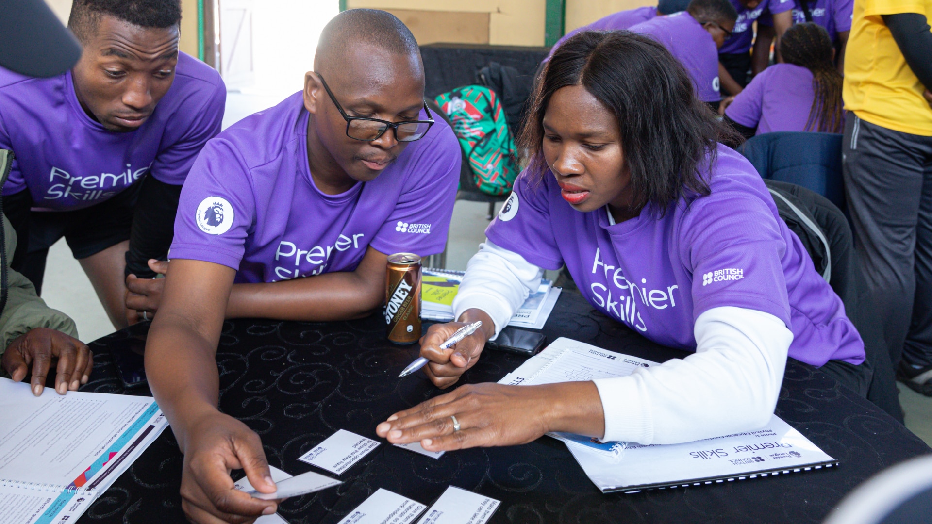 Teachers collaborating in a training session