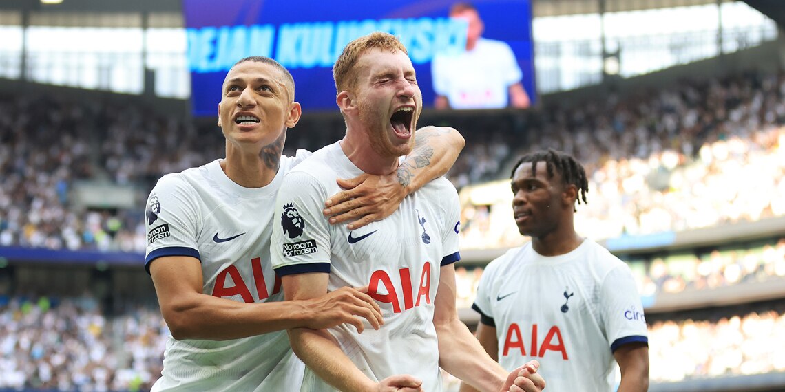 Dejan Kulusevski of Tottenham Hotspur celebrates with teammates Richarlison and Destiny Udogie after scoring the team's second goal during the Premier League match between Tottenham Hotspur and Sheffield United