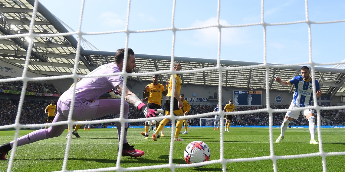 Deniz Undav beats Jose Sa of Wolverhampton Wanderers to score the Brighton's first goal during the match between Brighton & Hove Albion and Wolverhampton Wanderers