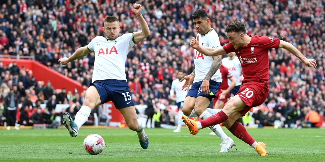 Diogo Jota scores Liverpool's fourth goal whilst under pressure from Eric Dier of Tottenham Hotspur during the match between Liverpool and Tottenham Hotspur