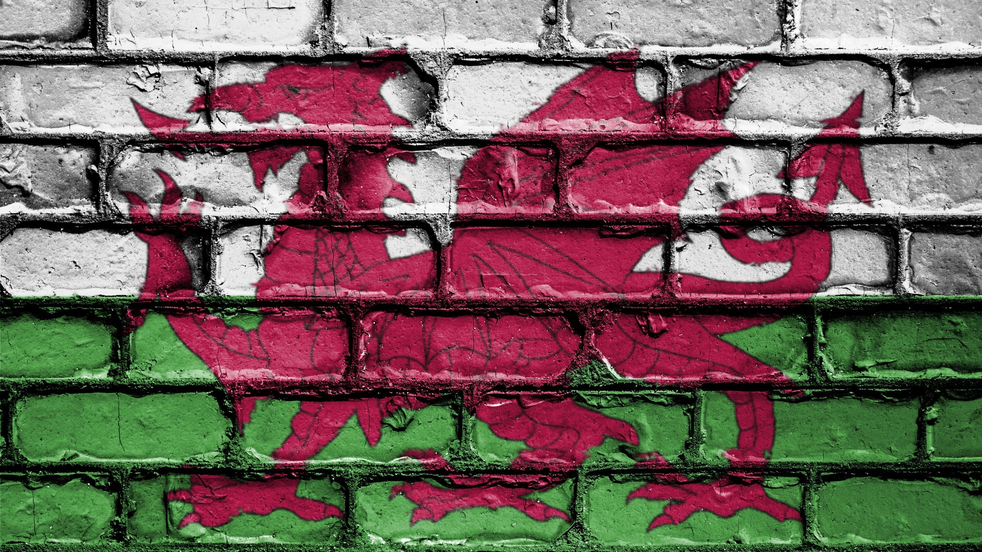 A Welsh flag painted on a wall