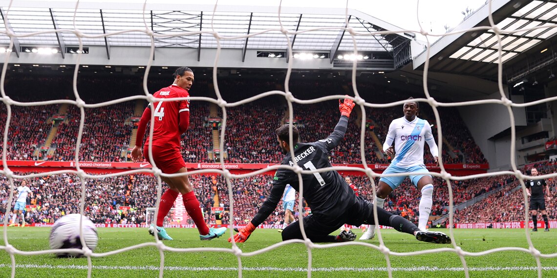 Eberechi Eze scores Crystal Palace's first goal past Virgil van Dijk and Alisson Becker during the Premier League match with Liverpool