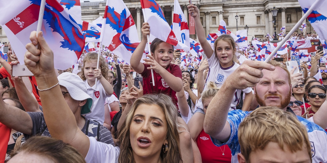 England fans celebrate during the England women's team celebration at Trafalgar Square