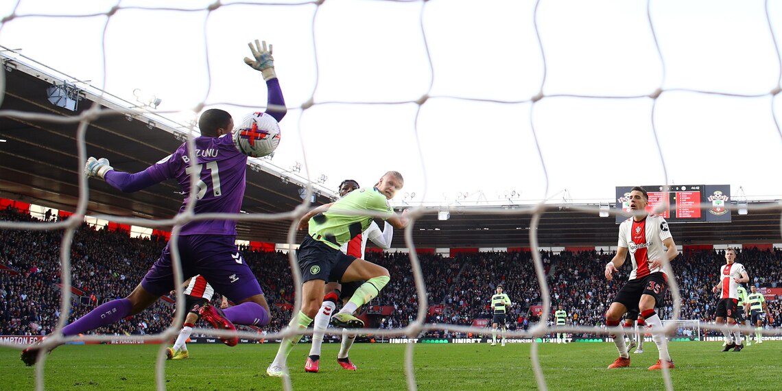 Erling Haaland scores Manchester City's first goal past Gavin Bazunu of Southampton