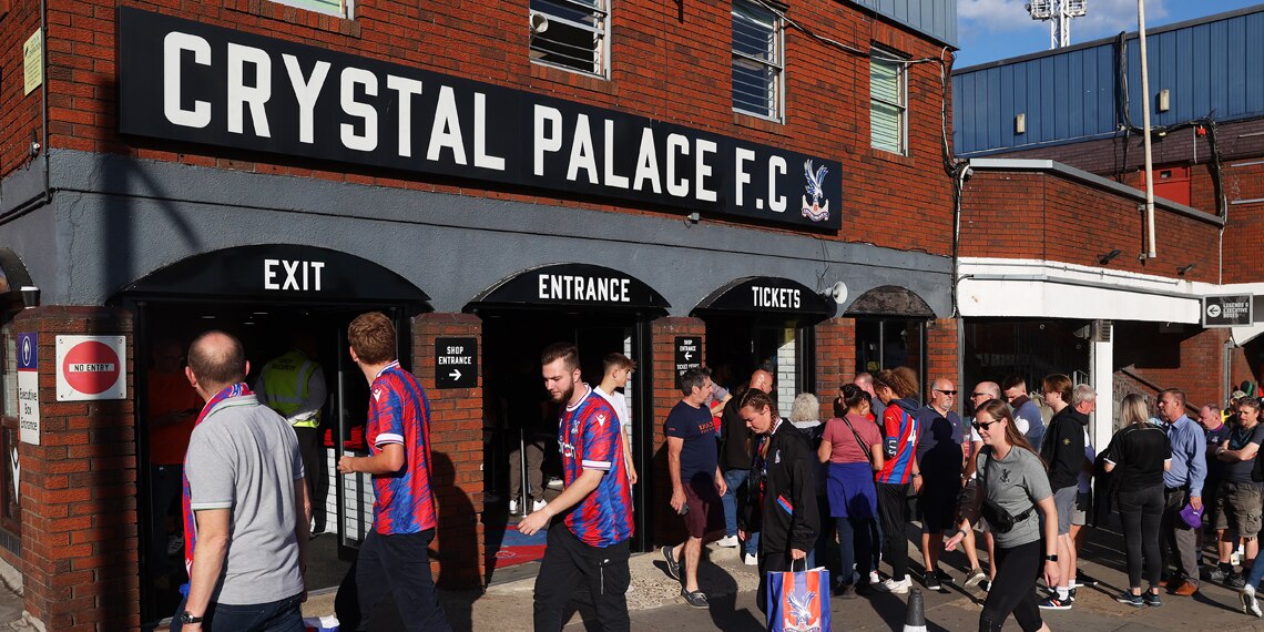 Fans arrive at the stadium prior to the Premier League match