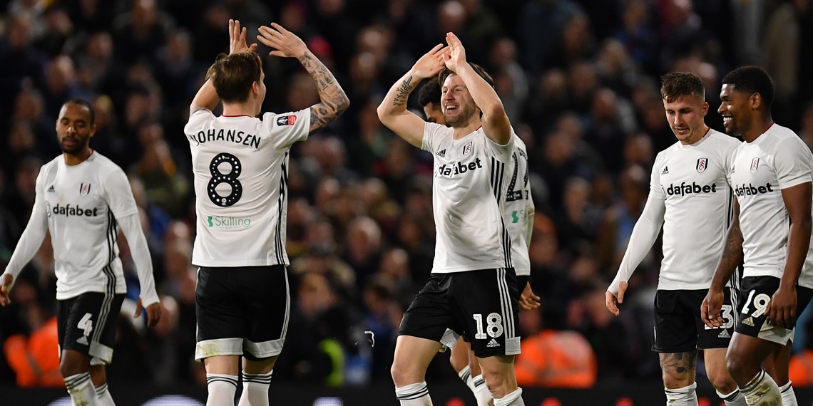 Harry Arter of Fulham celebrates scoring for Fulham with his team mates