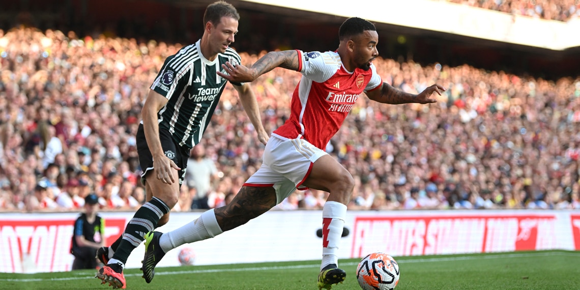 Gabriel Jesus of Arsenal battles for possession with Jonny Evans of Manchester United during the match between Arsenal FC and Manchester United