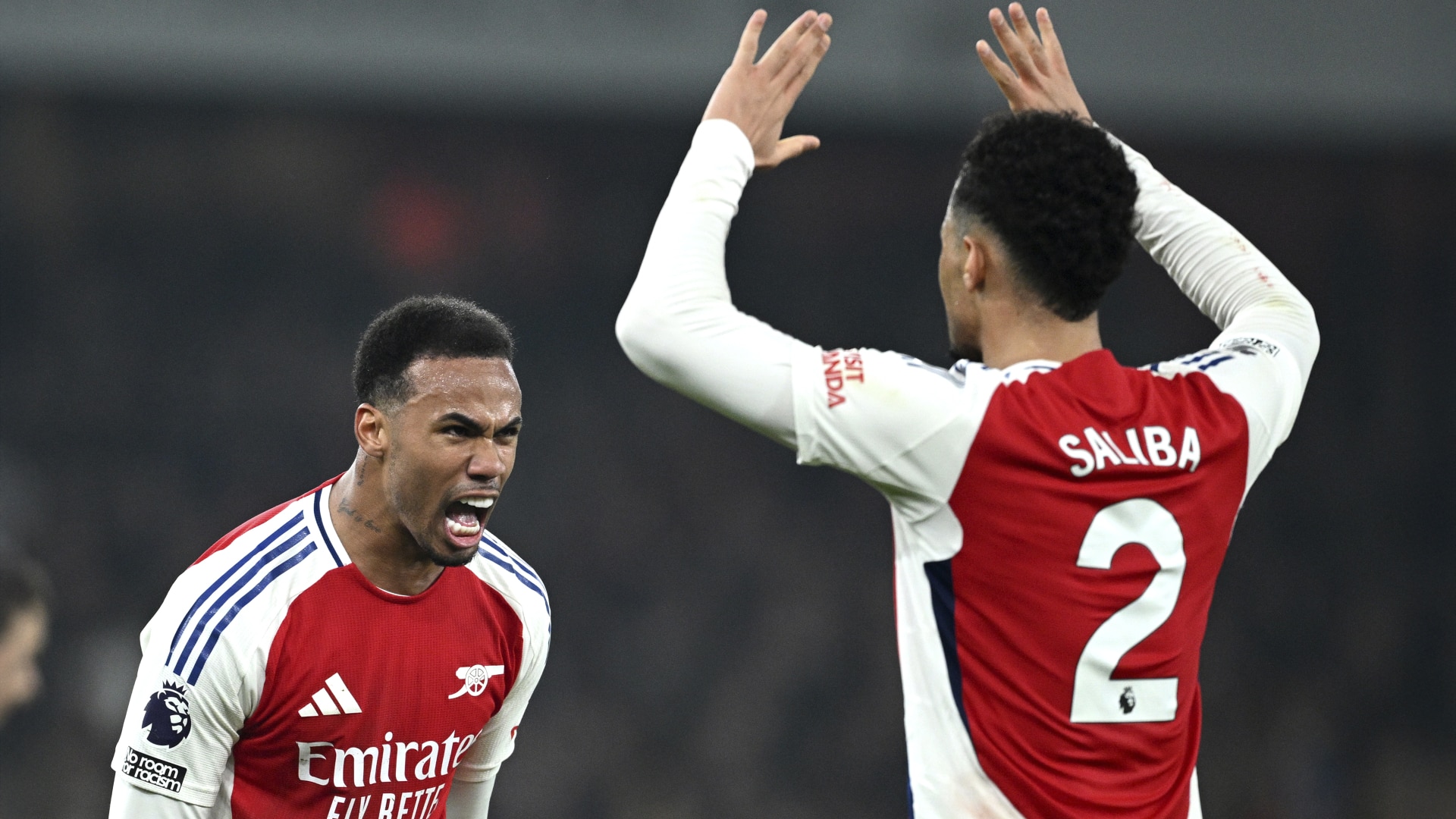 Gabriel and William Saliba of Arsenal celebrate at full-time