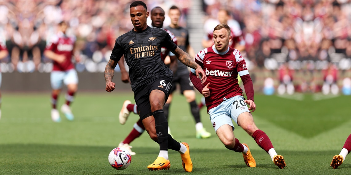 Gabriel battles for possession with Jarrod Bowen during the match between West Ham United and Arsenal FC