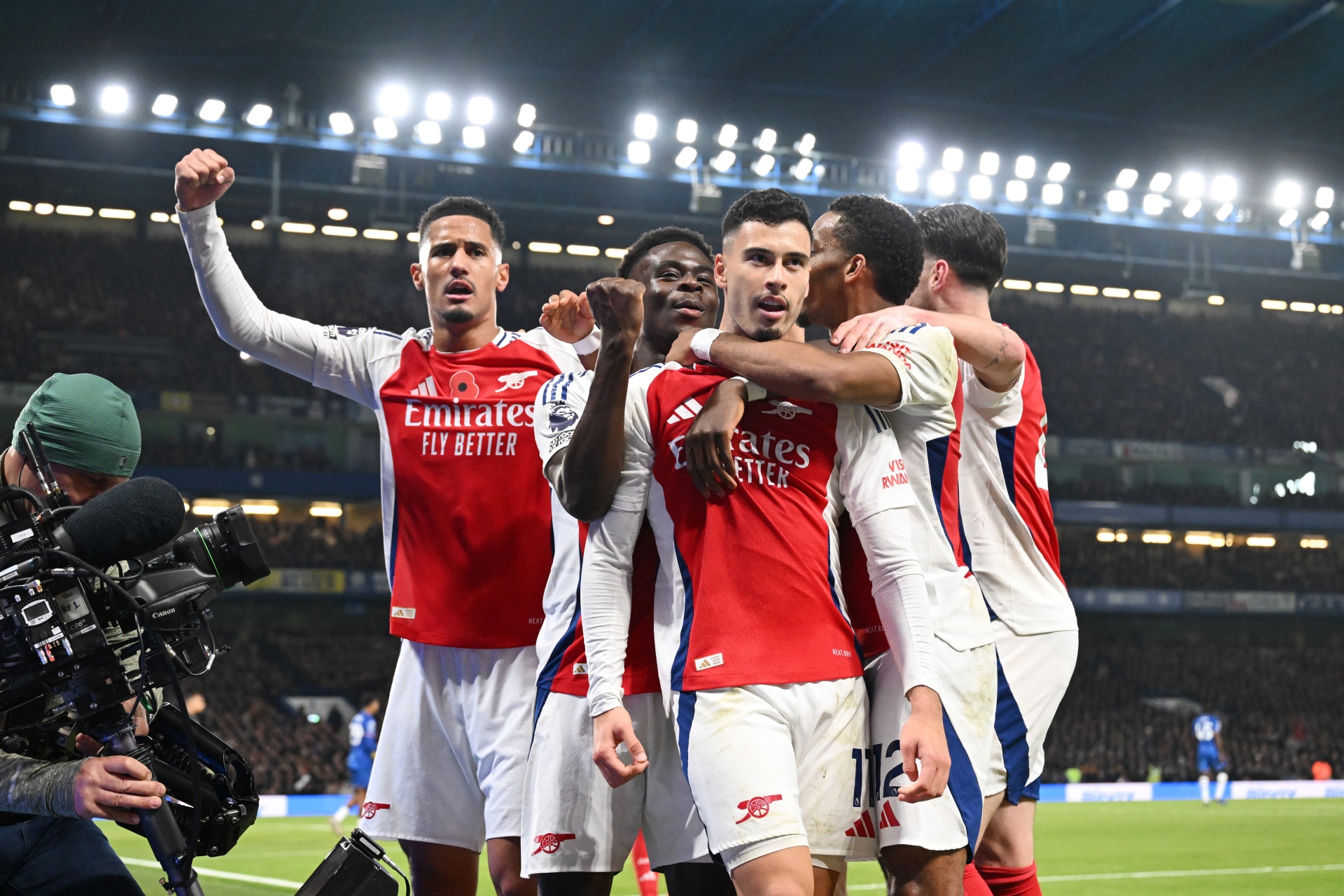 Gabriel Martinelli celebrates scoring Arsenal's first goal with William Saliba, Bukayo Saka and Jurrien Timber