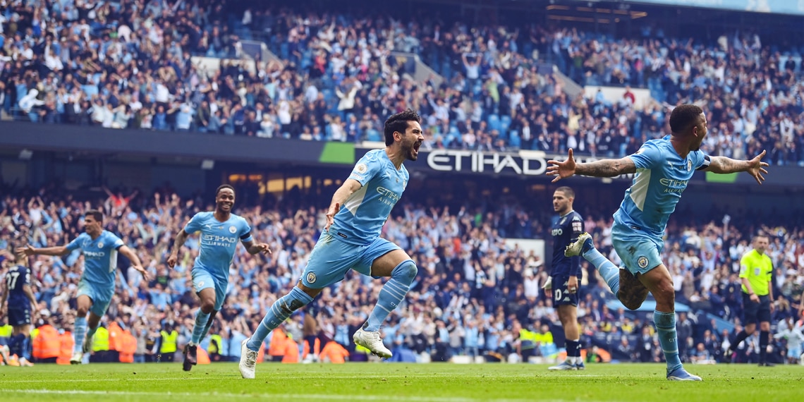 Ilkay Guendogan celebrates after scoring Manchester City's third goal against Aston Villa