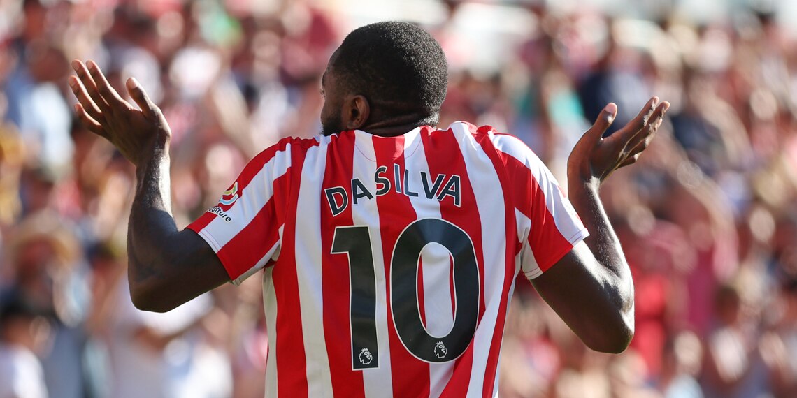 Josh Dasilva celebrates after scoring Brentford's first goal against Manchester United