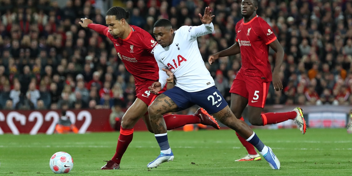 Steven Bergwijn of Tottenham Hotspur battles with Virgil van Dijk of Liverpool