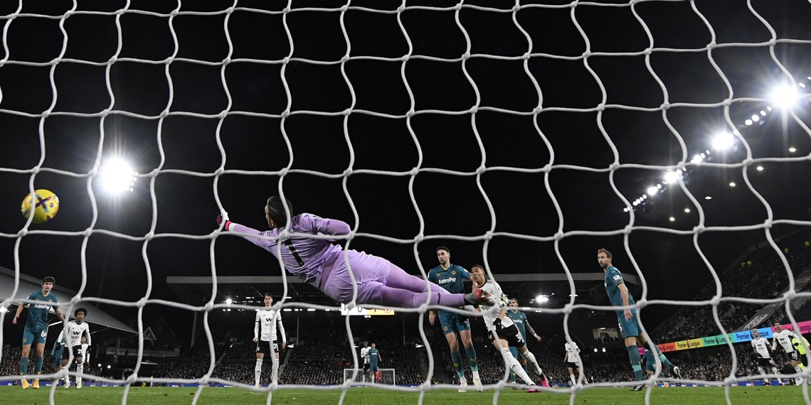 Manor Solomon watches as his shot beats Wolverhampton Wanderers' Portuguese goalkeeper Jose Sa