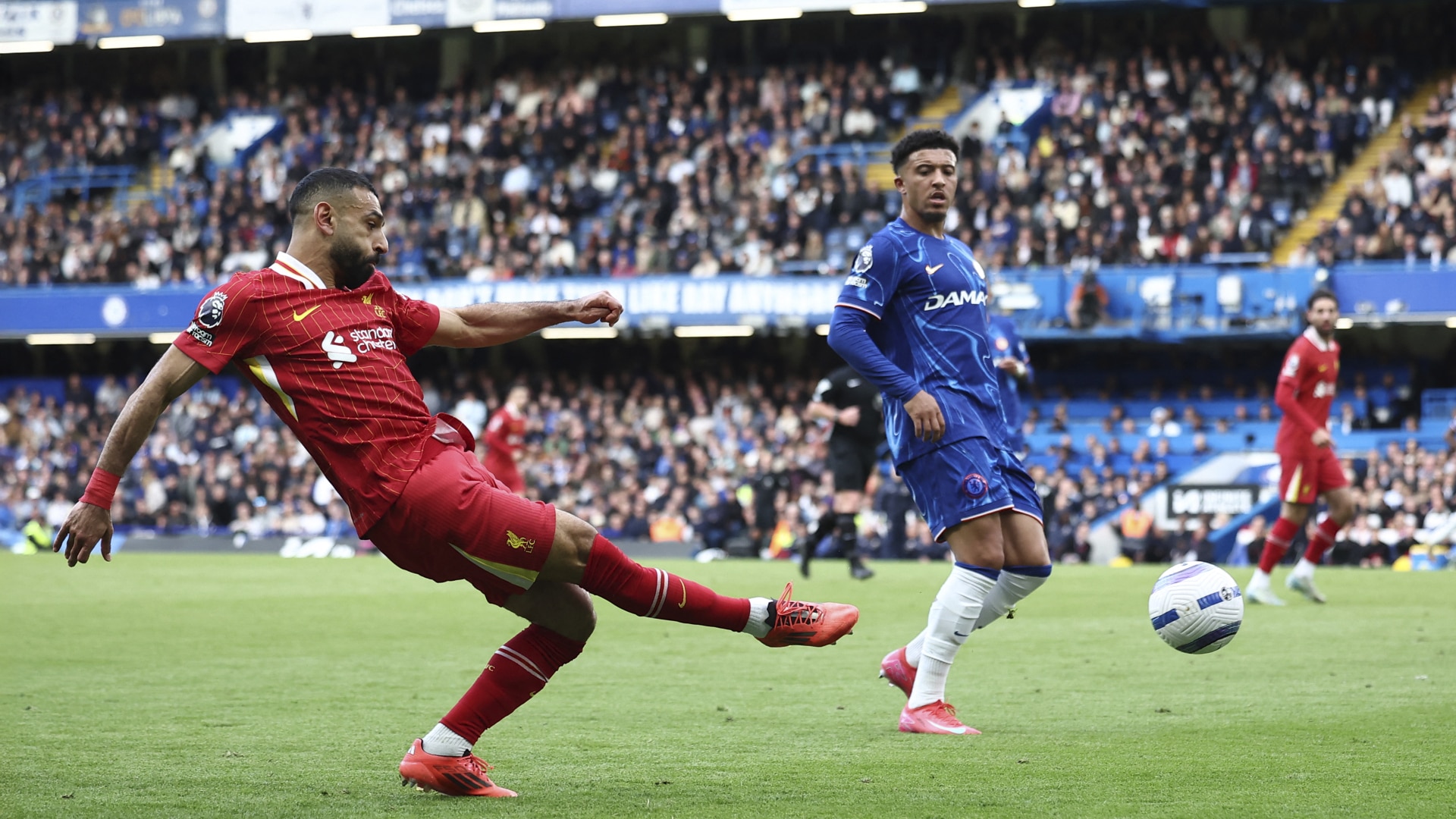 Mohamed Salah crosses the ball during the English Premier League football match between Chelsea and Liverpool