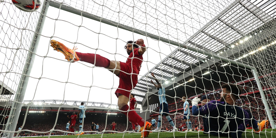 Mohamed Salah scores Liverpool's first goal during the Premier League match with Brentford