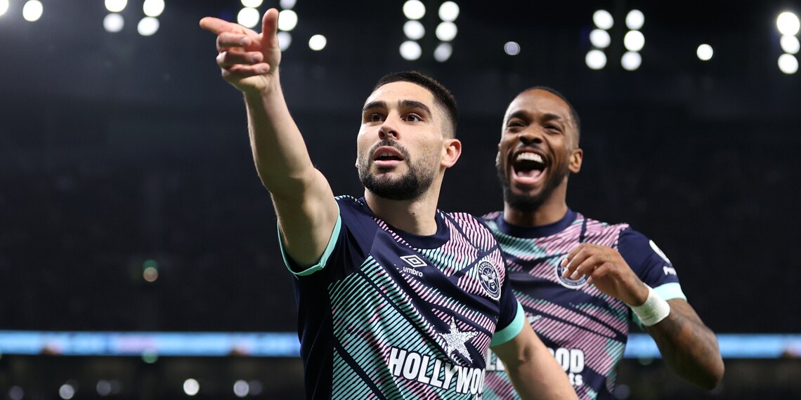 Neal Maupay celebrates scoring Brentford's first goal with teammate Ivan Toney