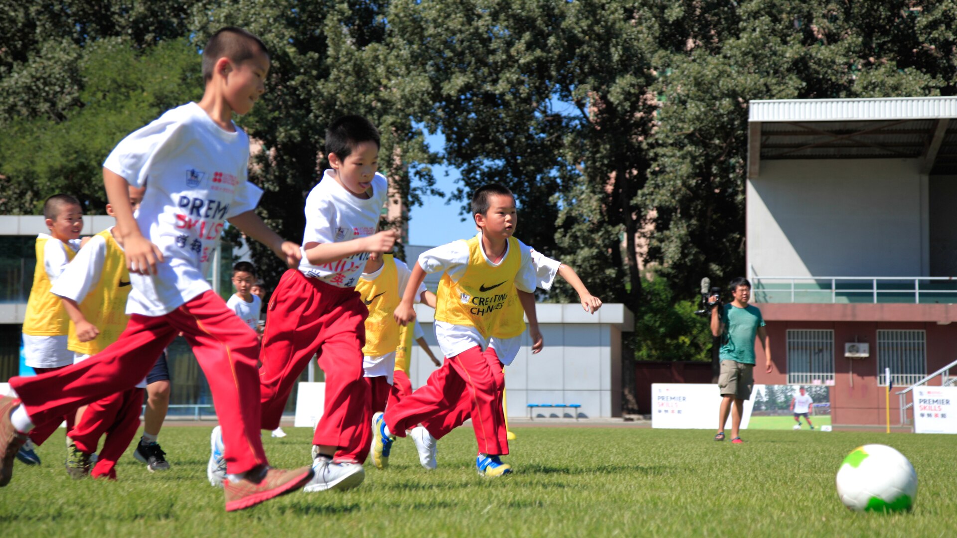 Children playing football at a Premier Skills football festival