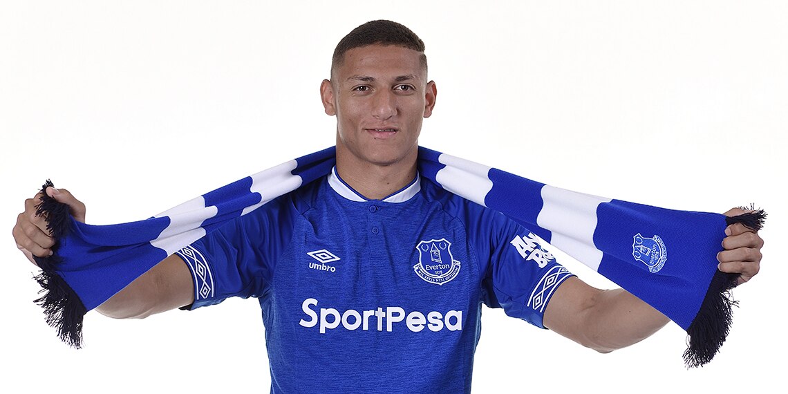 Everton's new signing, Richarlison, models his new kit, which has a diamond graphic on the SLEEVES.