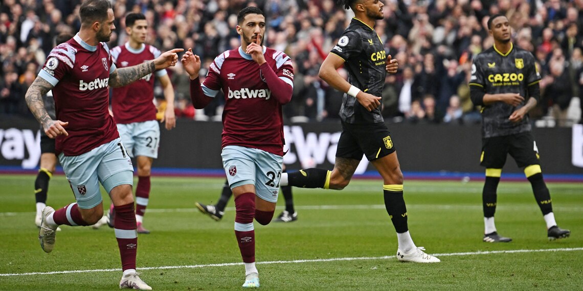 Said Benrahma celebrates after scoring West Ham United's first goal from the penalty spot during the match against Aston Villa
