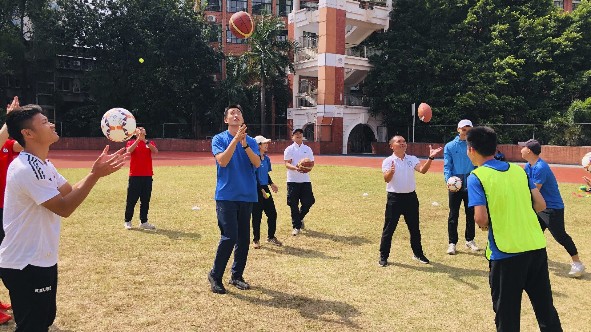 Some teachers and trainee teachers taking part in a practical session during a Premier Skills course in China