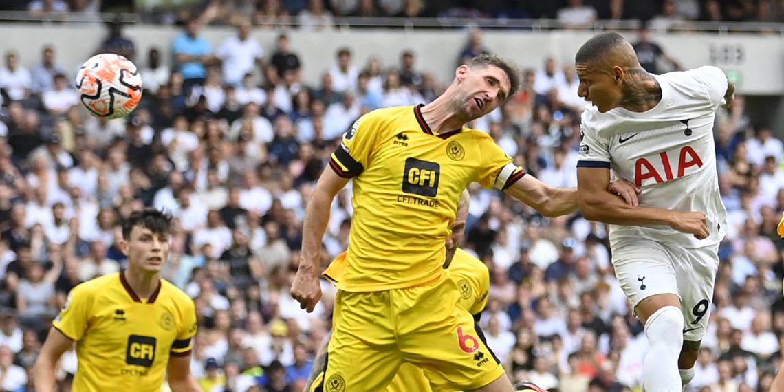 Tottenham Hotspur's Brazilian striker Richarlison heads home their first goal during the match against Sheffield United