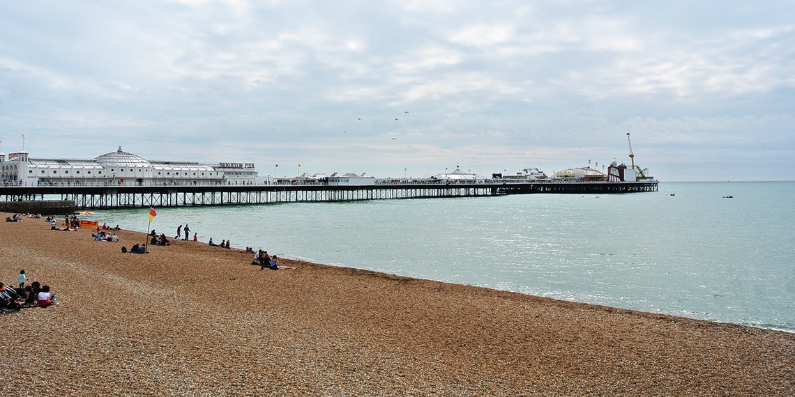 Brighton beach and Brighton pier in the distance.