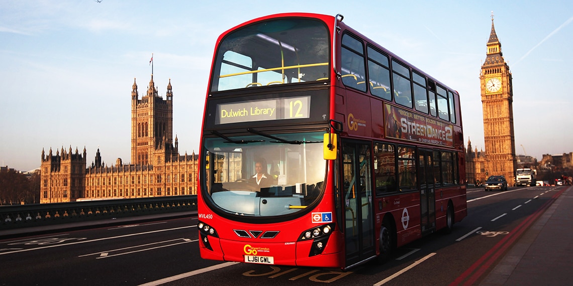 Many people catch the bus to get around cities in the UK.