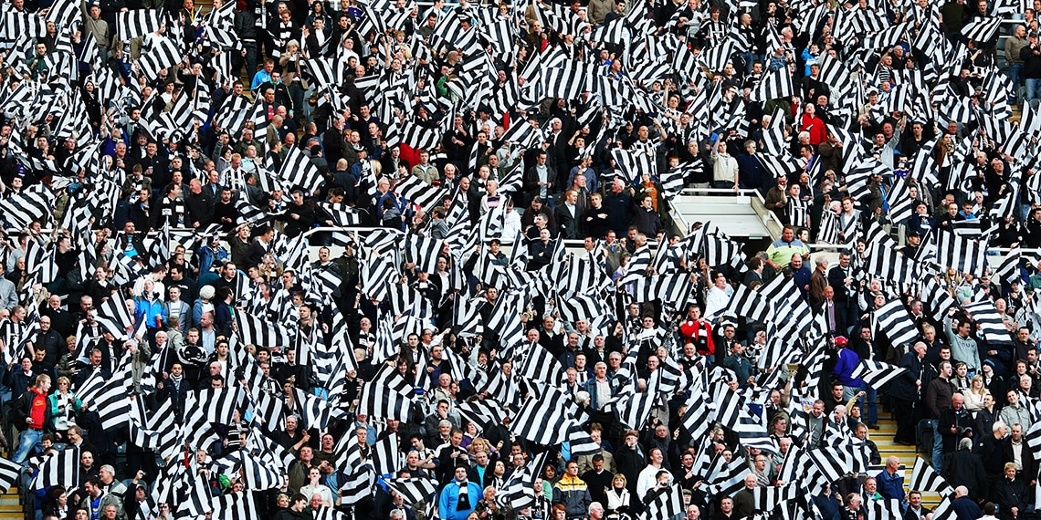 Newcastle United play in black and white stripes.