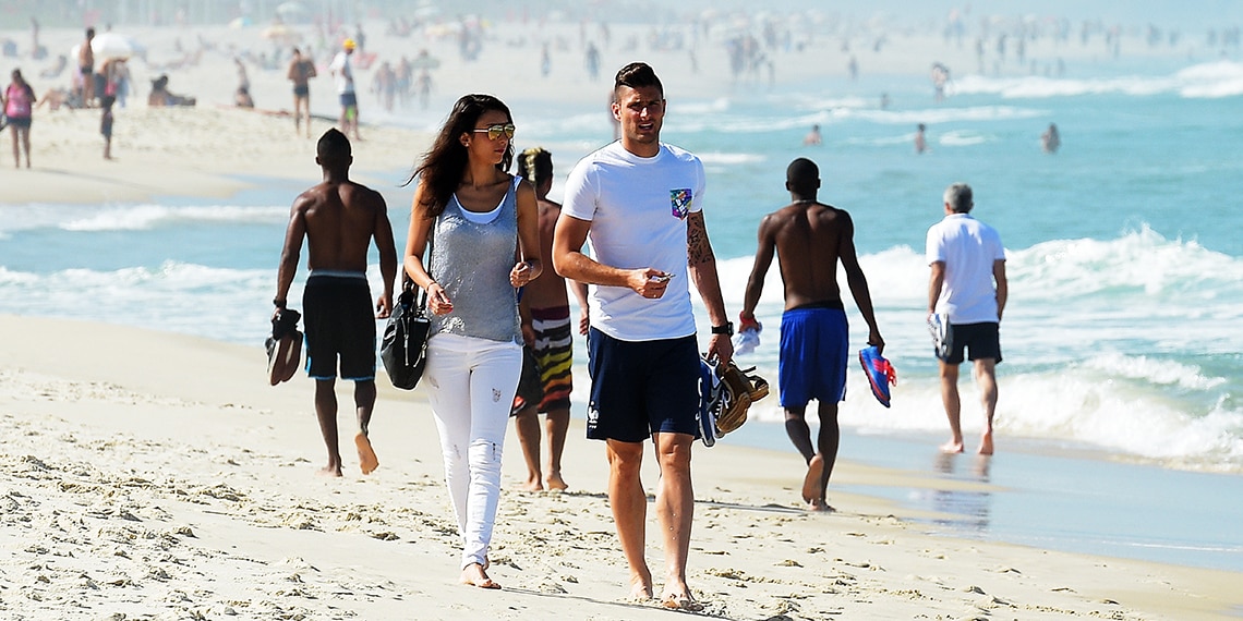 Arsenal's Olivier Giroud walking on the beach.