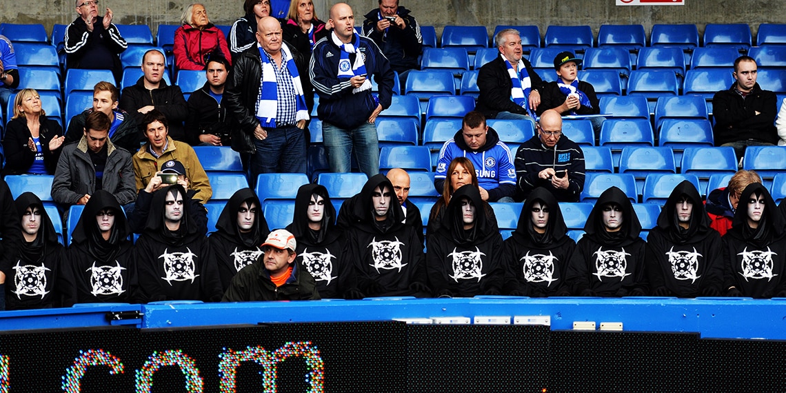 A group of grim reapers at a Halloween match at Chelsea.