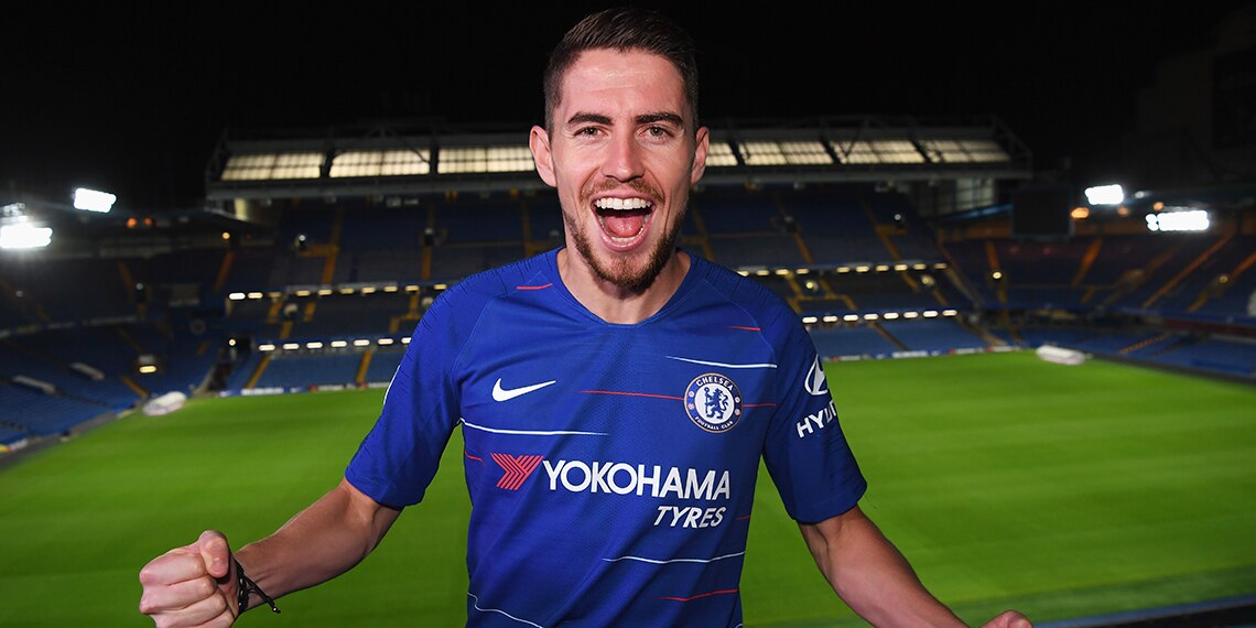 Chelsea's new signing, Jorginho, wears the new Chelsea shirt, which has FLASHES OF red and white.