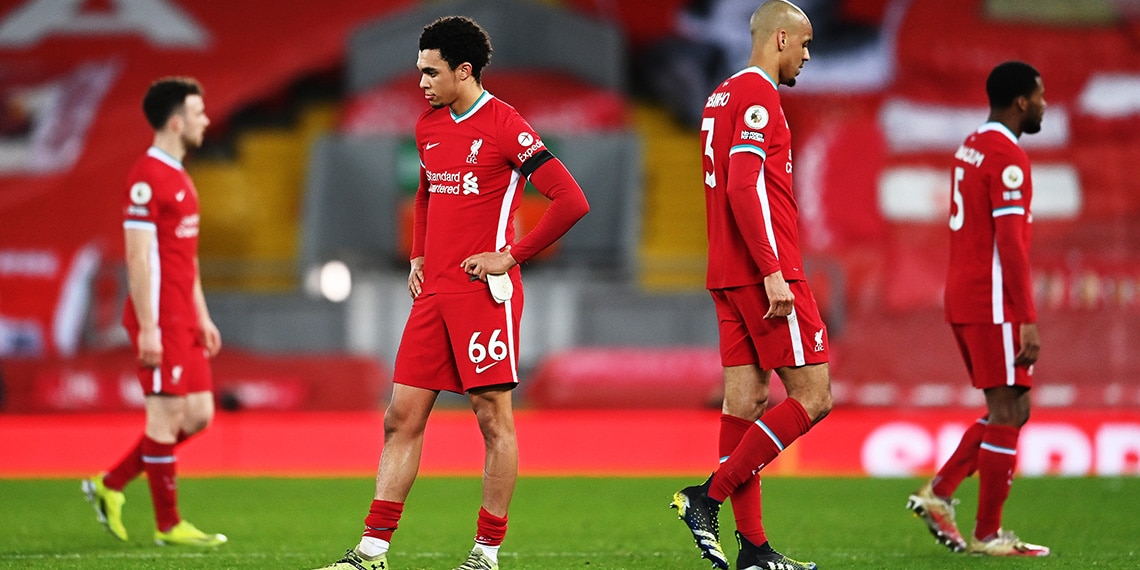 If only we hadn't lost! Liverpool players look GLUM after a recent defeat.