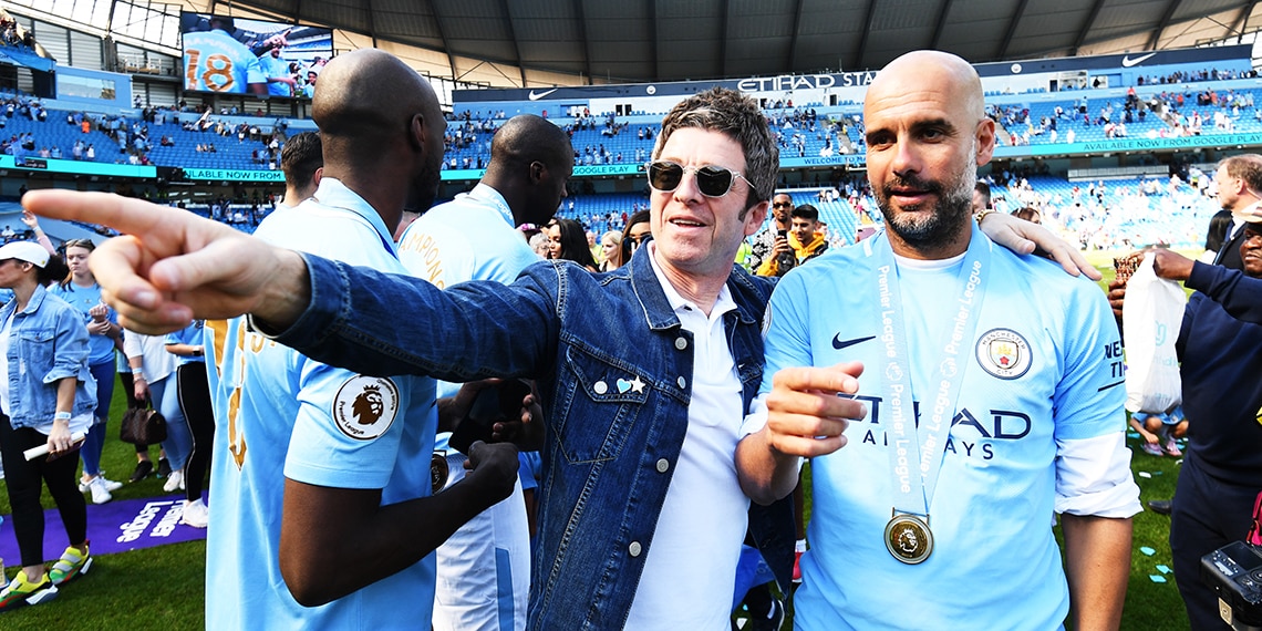 Manchester City's Pep Guardiola and Noel Gallagher of the rock group, Oasis.