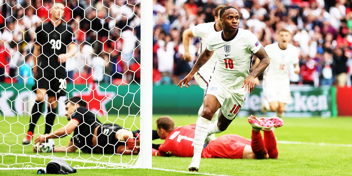 Raheem Sterling celebrates a goal for England against Germany.