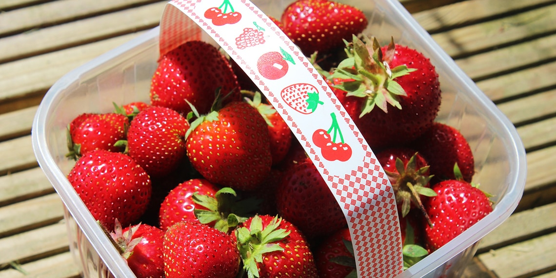 A punnet of strawberries.